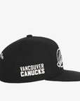 Vancouver Canucks Mitchell & Ness Youth Skate Black and White Snapback