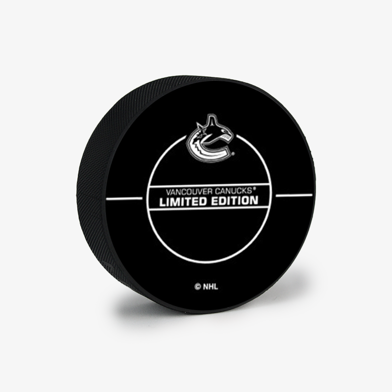 Vancouver Canucks Black Excellence Puck