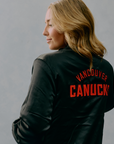 Vancouver Canucks Signature Collection Women's Reversible Sherpa Black Skate Bomber Jacket