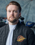 Vancouver Canucks Black Letter Puff Skate Jacket