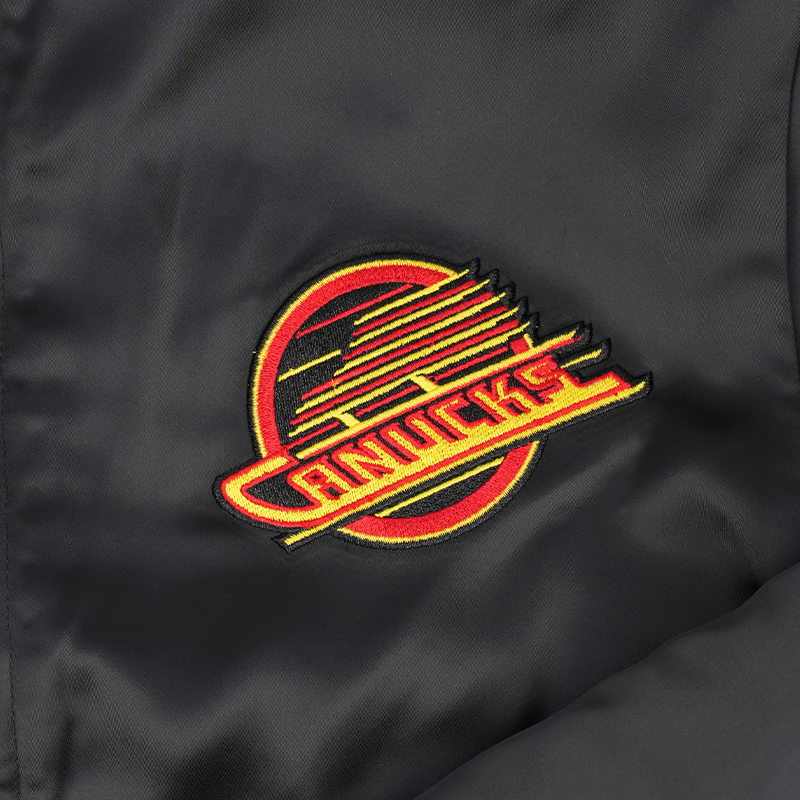 Vancouver Canucks Signature Collection Women's Reversible Sherpa Black Skate Bomber Jacket