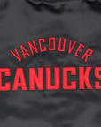 Vancouver Canucks Signature Collection Women's Reversible Sherpa Black Skate Bomber Jacket