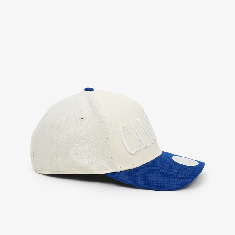 Vancouver Canucks New Era Women's 940 M-Crown Two Tone Blue/Cream Tonal Script Orca Hat