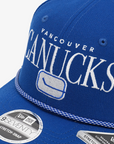 Vancouver Canucks New Era 970 Stretch Snap Rope Trucker Blue Stick in Rink Hat