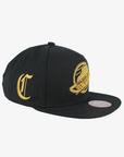 Vancouver Canucks Mitchell & Ness Gold Gothic Skate Snapback Hat