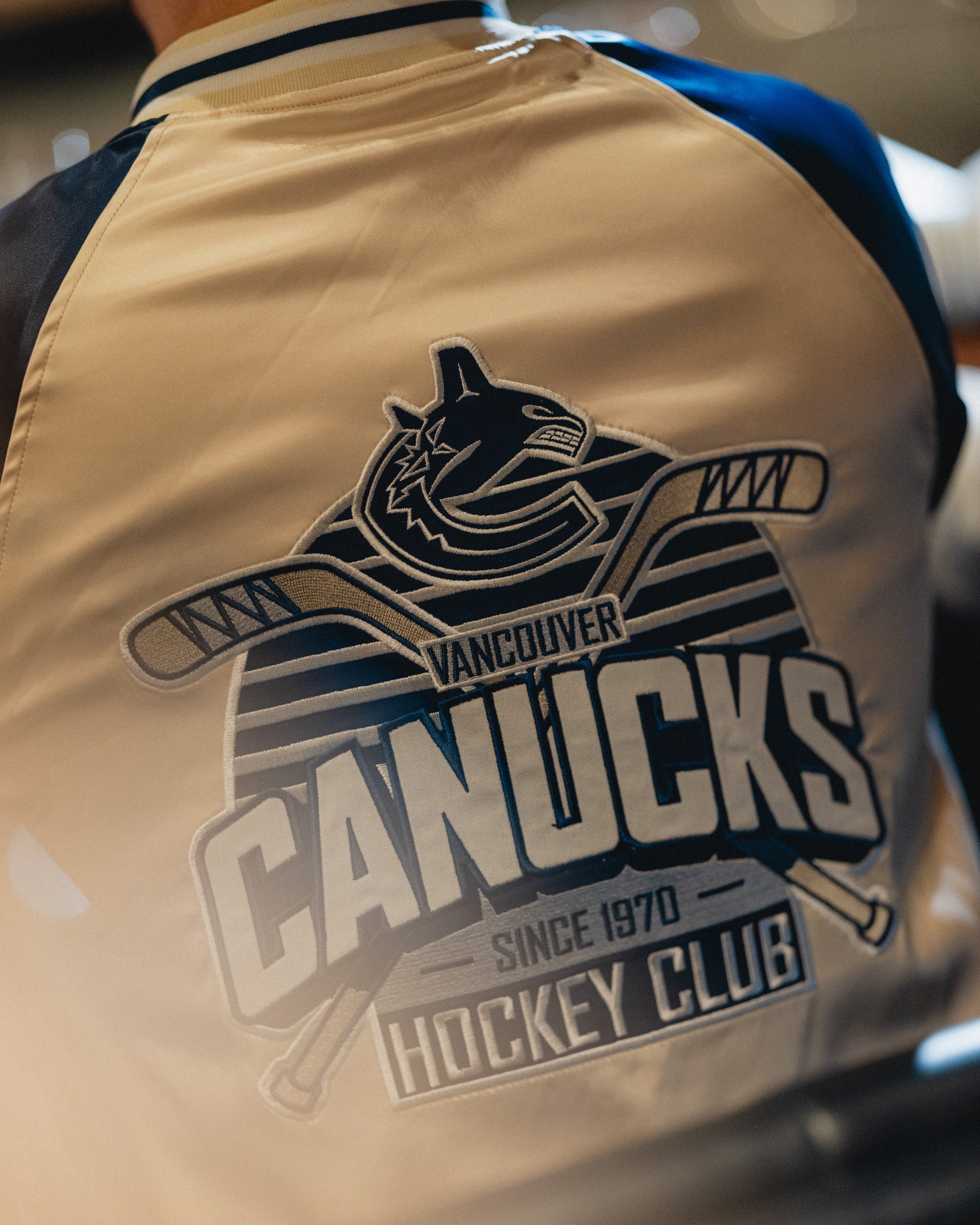 Vancouver Canucks Wild Collective Satin Bomber Jacket